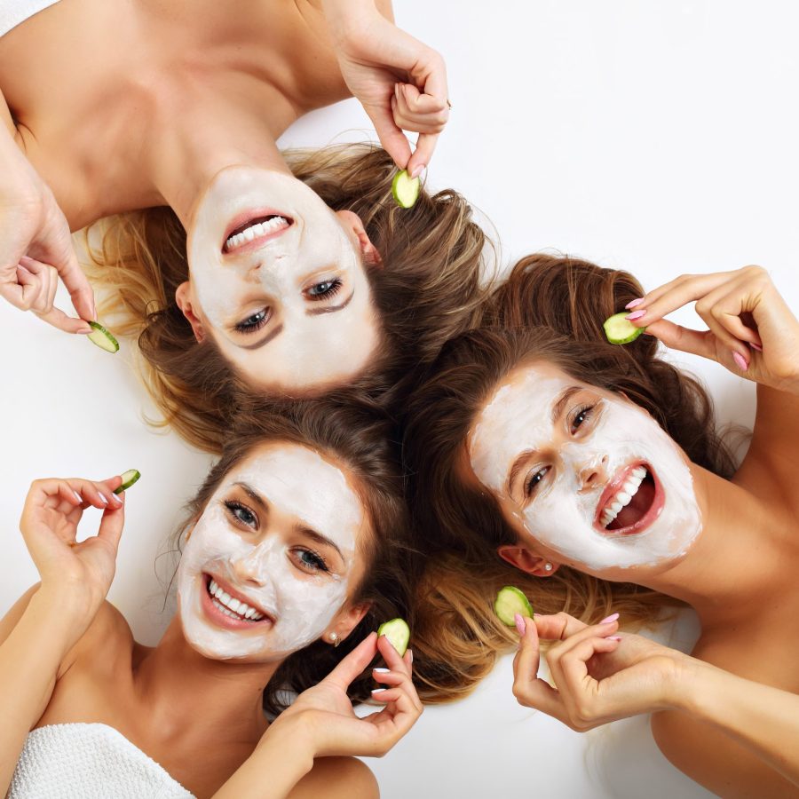 Picture,Showing,Three,Friends,With,Facial,Masks,Over,White,Background